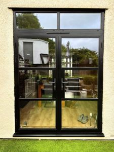 Heritage smart aluminium doors with a toplight Hayker Windows Ltd